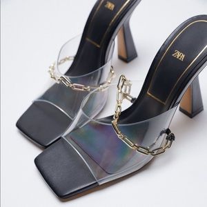 HEELED VINYL MULES WITH CHAIN